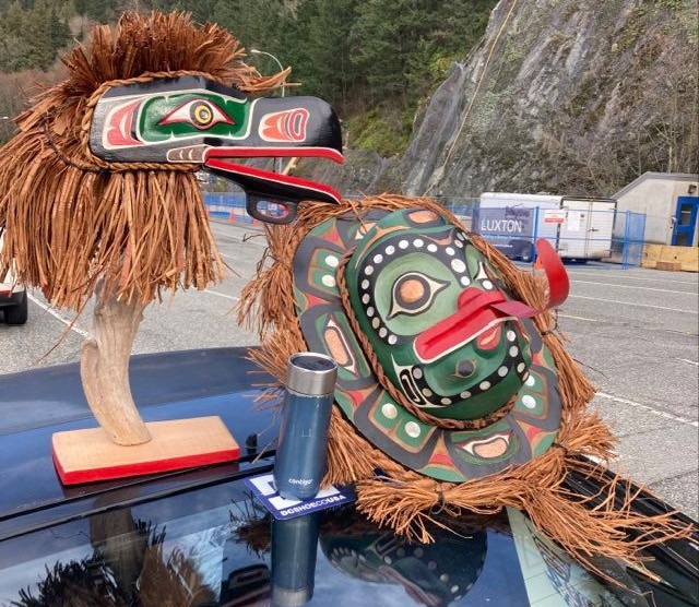 Jerry's traditional Indigenous masks with cedar bark fringe